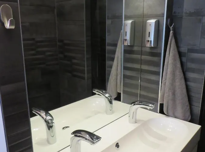 Naturist Cap Carbone 아그